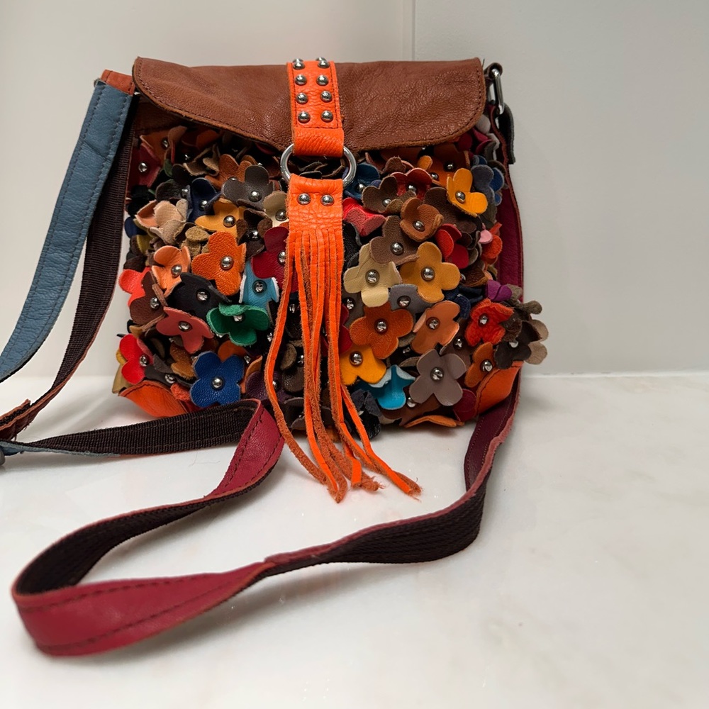 Ameri leather crossbody bag: multi color. Never been used.